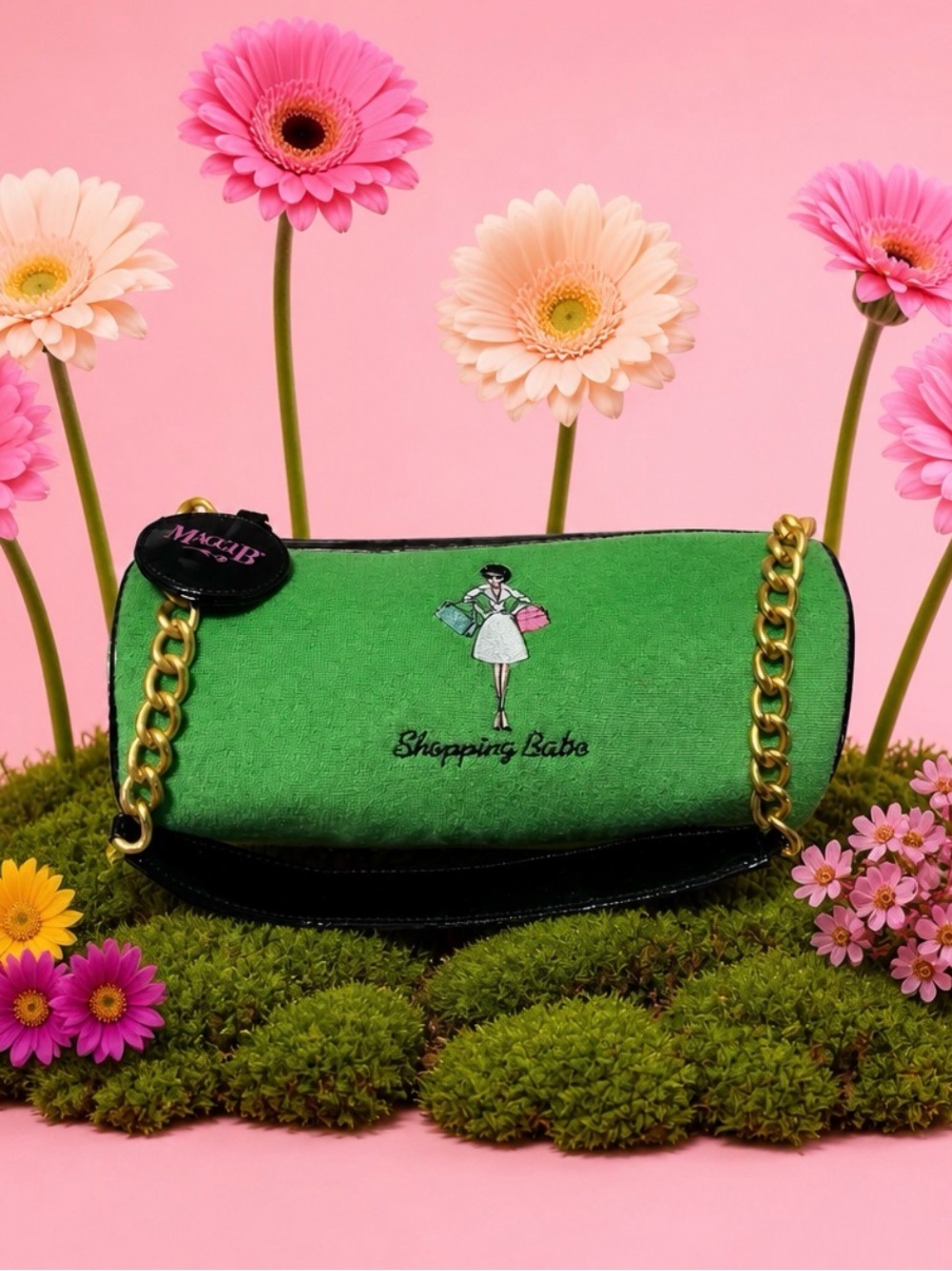 Green Shoulder Bag with Gold Chain and Playful Shopping Girl Motif